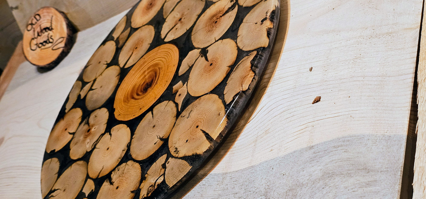 Wooden lazy susan with circular pattern on a light wooden surface