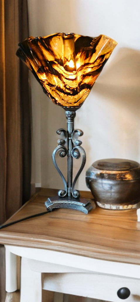 Handcrafted rustic lamp. Wood/resin construction with antique hammered metal finish. Gold/black detail shade.