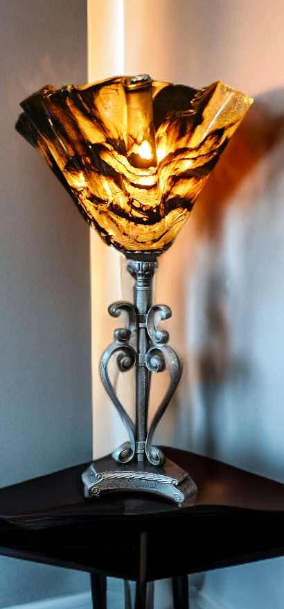 Handcrafted rustic lamp. Wood/resin construction with antique hammered metal finish. Gold/black detail shade.