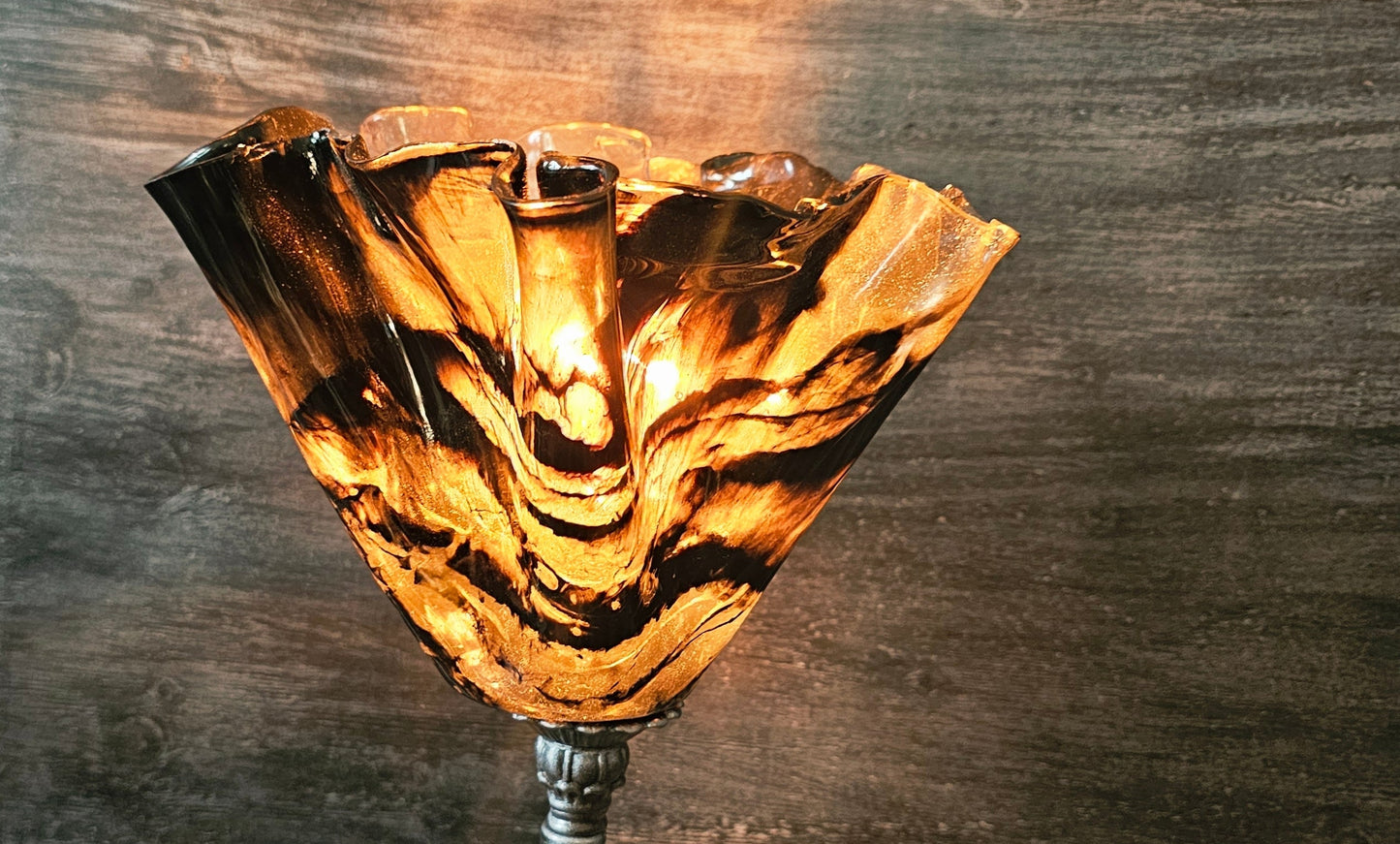 Handcrafted rustic lamp. Wood/resin construction with antique hammered metal finish. Gold/black detail shade.